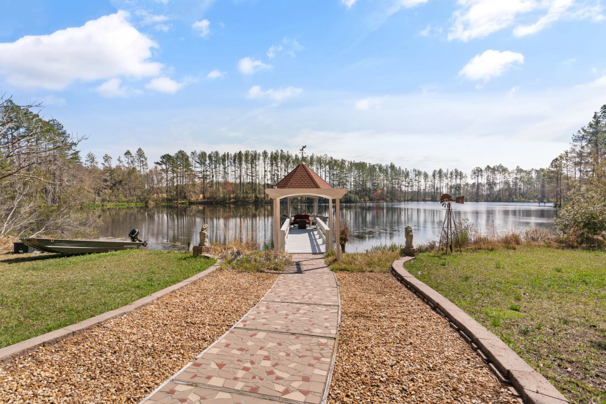 Private dock on a 10-acre stocked lake, ideal for fishing and boating