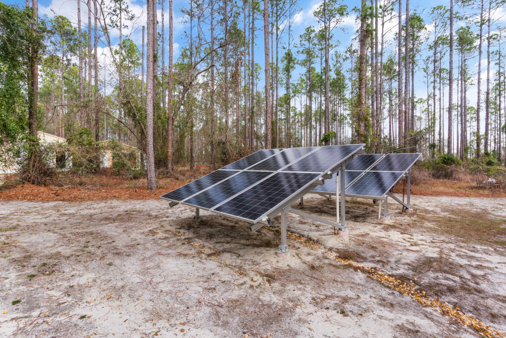 Solar-powered Atlas commercial greenhouse with an off-grid 12,000-watt lithium battery system