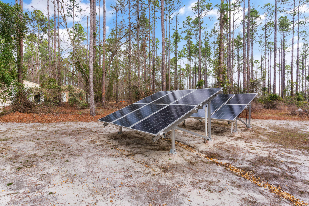 Solar-powered Atlas commercial greenhouse with an off-grid 12,000-watt lithium battery system