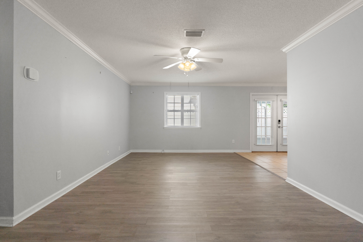 DSC03265 Open living room in Glynn Haven home for sale on St Simons Island with natural light and flexible layout